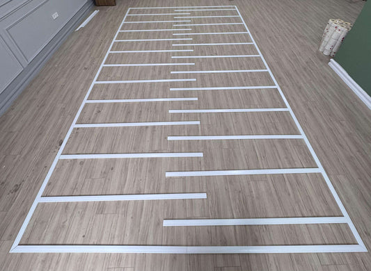 Pre-cut Flat Wall Molding Kit pieces laid out before installation alternate view