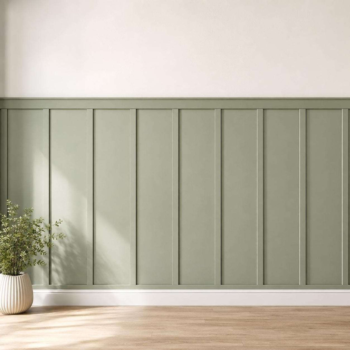 Half wall trim idea: sage green board and batten half wall on an accent wall