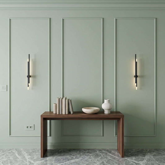 Sage green picture frame wall molding in an entryway alternate view