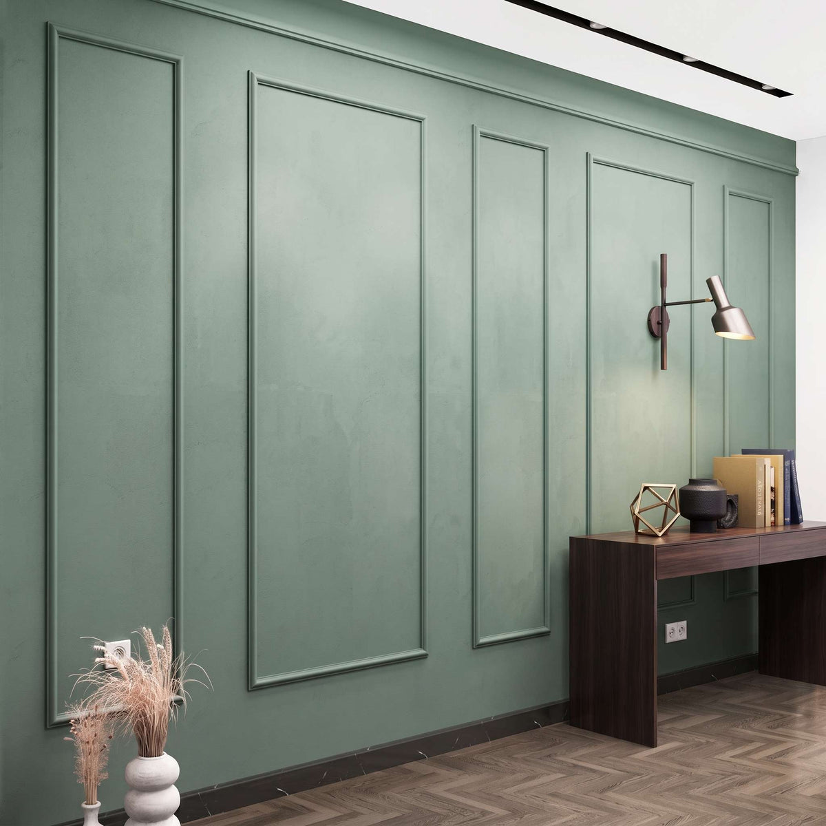 Sage green picture frame wall molding in a home office