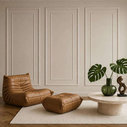 Cream double picture frame wall molding in a living room
