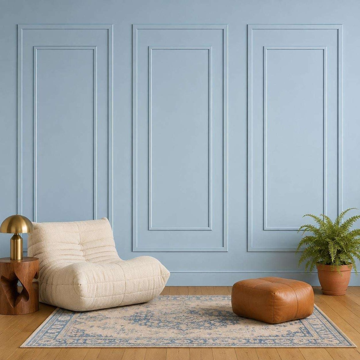 Light blue double picture frame wall molding in a living room