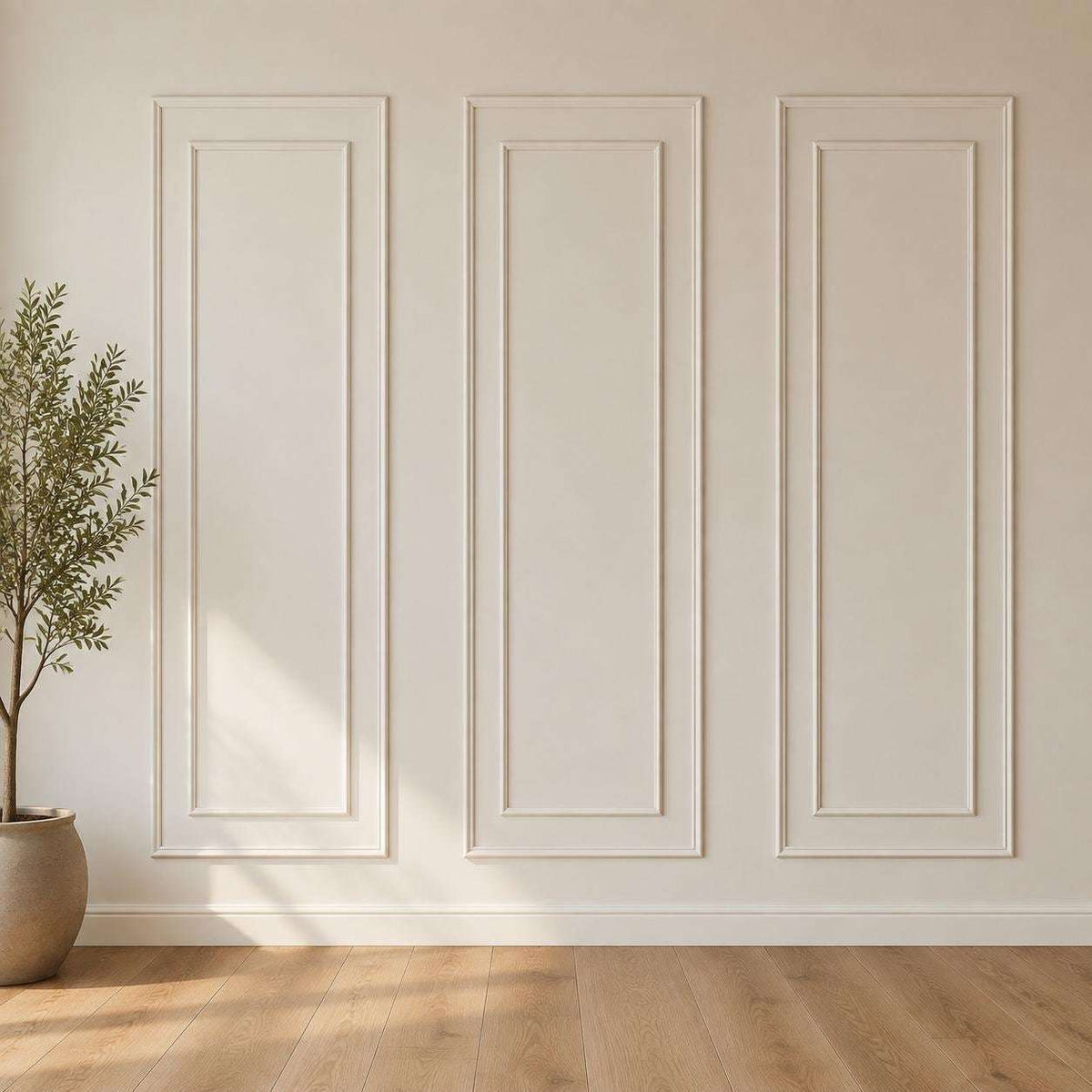 White double picture frame wall molding on an accent wall