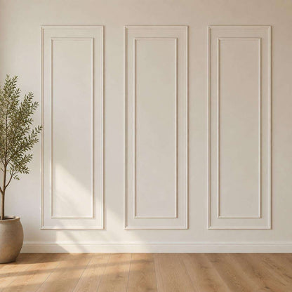 White double picture frame wall molding on an accent wall