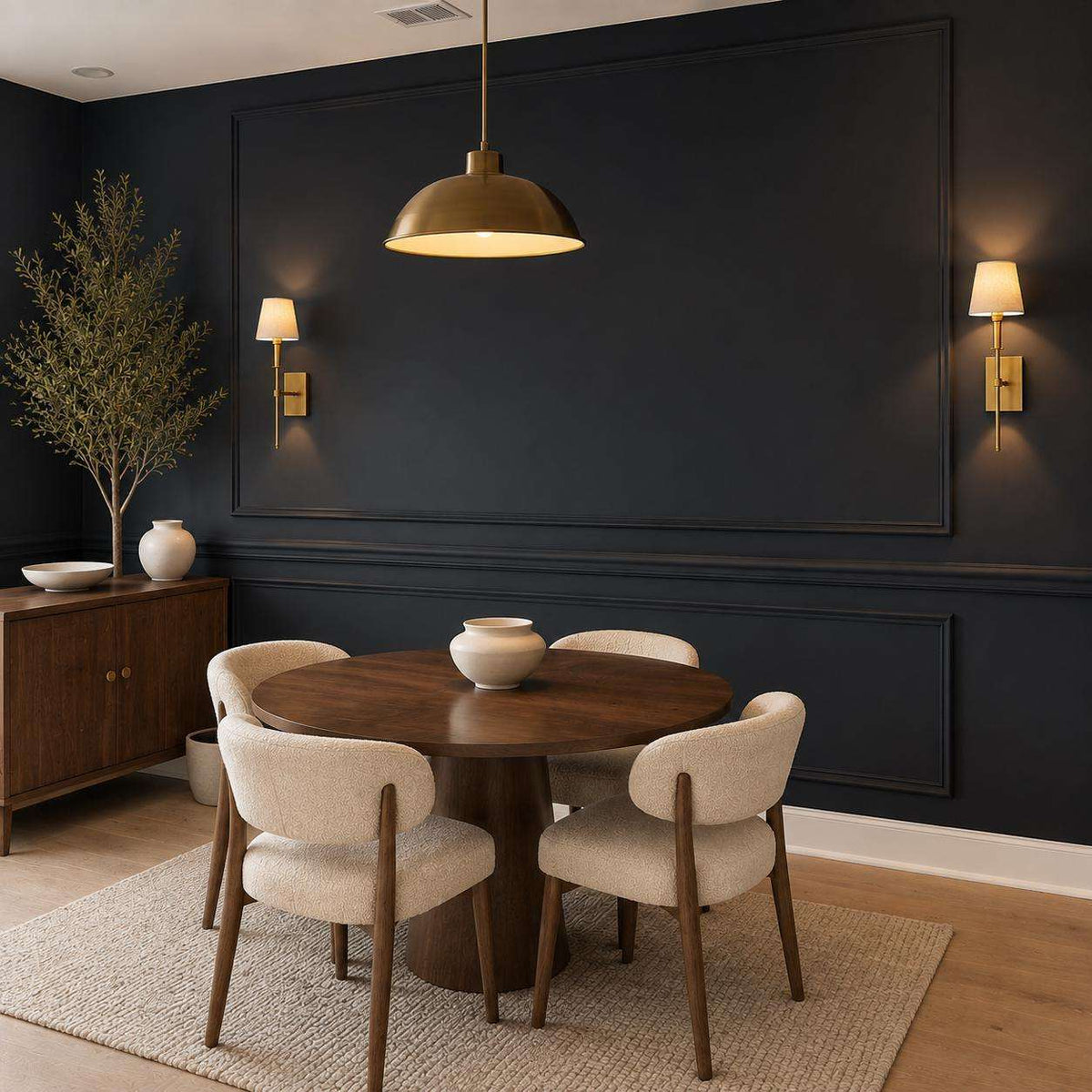 Navy picture frame wall molding in a dining room