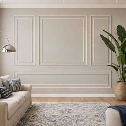 Greige picture frame wall molding in a living room