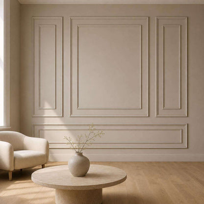 Beige picture frame wall molding on an accent wall