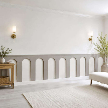Half wall trim idea: light gray half wall arch molding in a living room