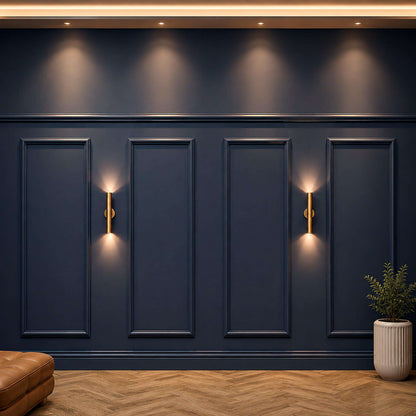 Navy picture frame wall molding on an accent wall