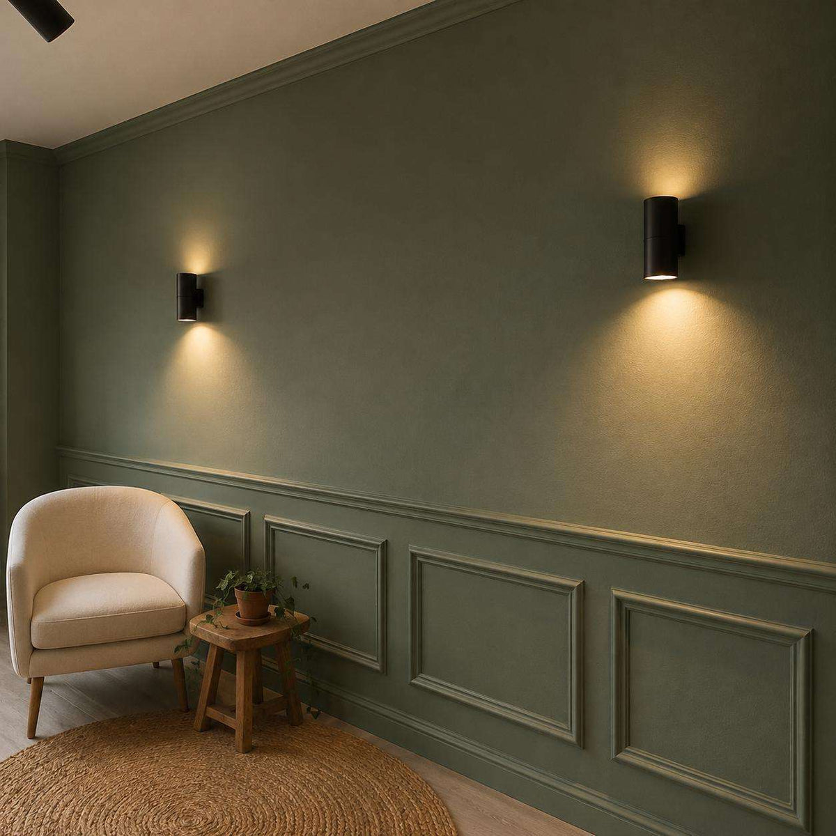 Half wall trim idea: olive green half wall picture frame wainscoting in a living room