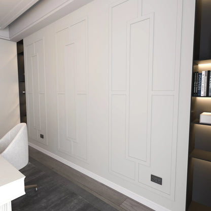 Modern wall molding: white geometric wall molding on an accent wall