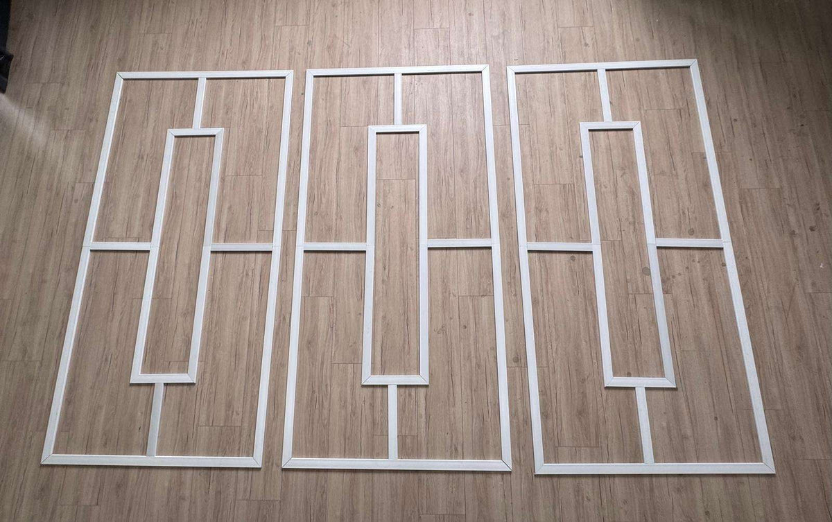 Pre-cut Modern Wainscoting Kit pieces laid out before installation