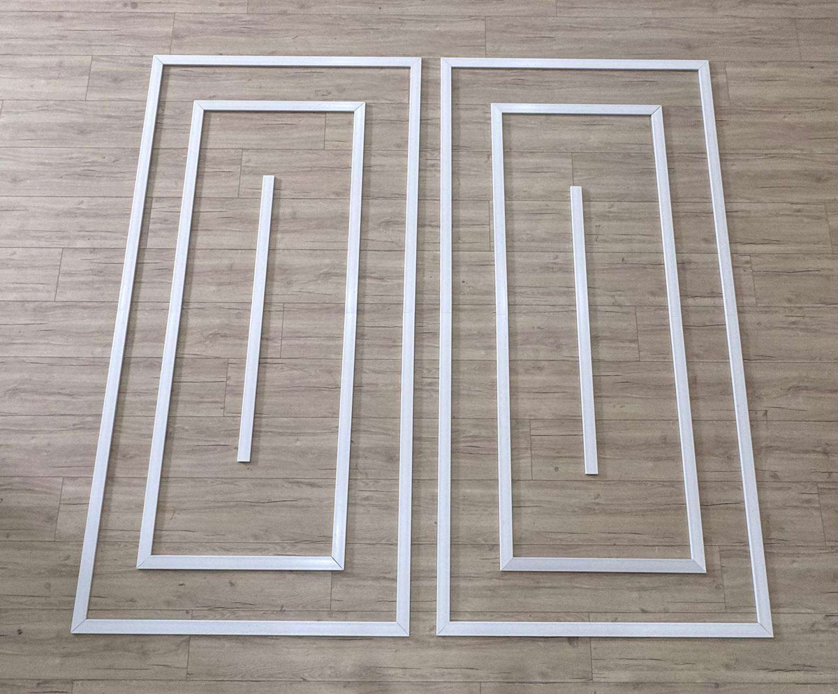 Pre-cut Modern Wall Molding Kit pieces laid out before installation