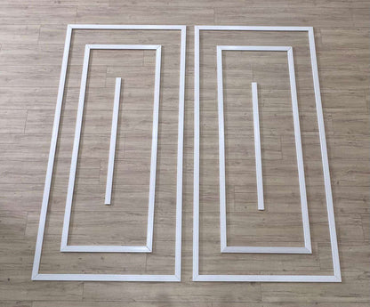 Pre-cut Modern Wall Molding Kit pieces laid out before installation