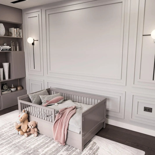 Light gray picture frame wall molding in a nursery alternate view