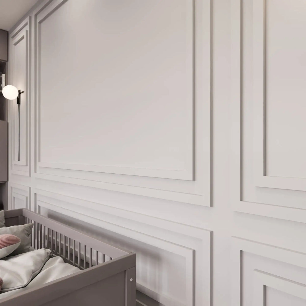 Light gray picture frame wall molding in a nursery, wide view