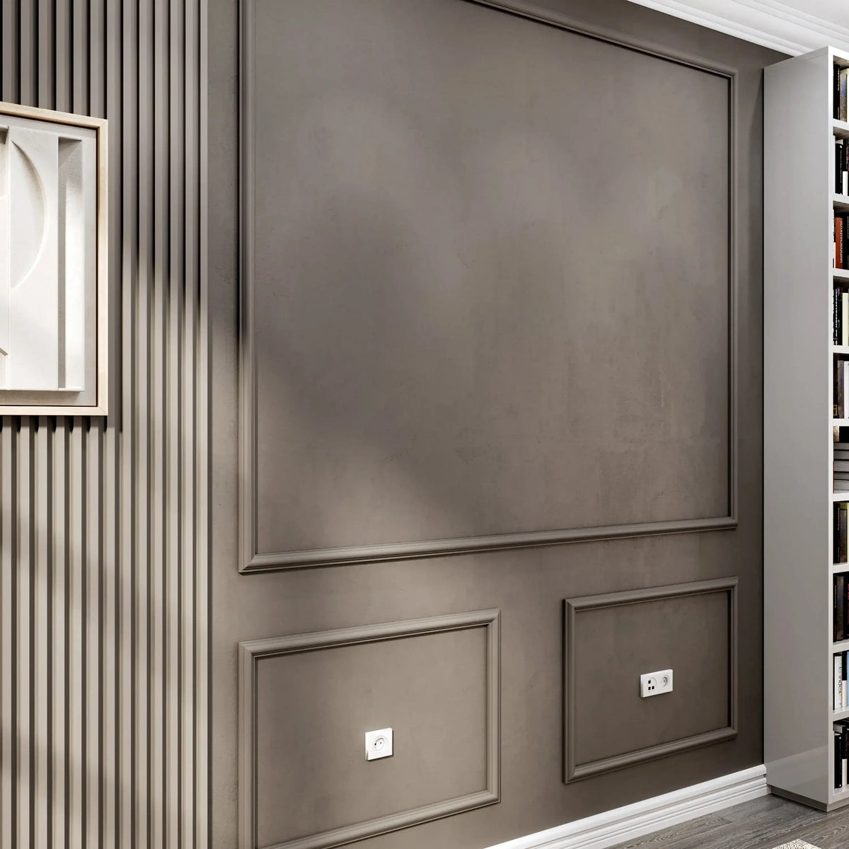 Charcoal gray picture frame wall molding on an accent wall