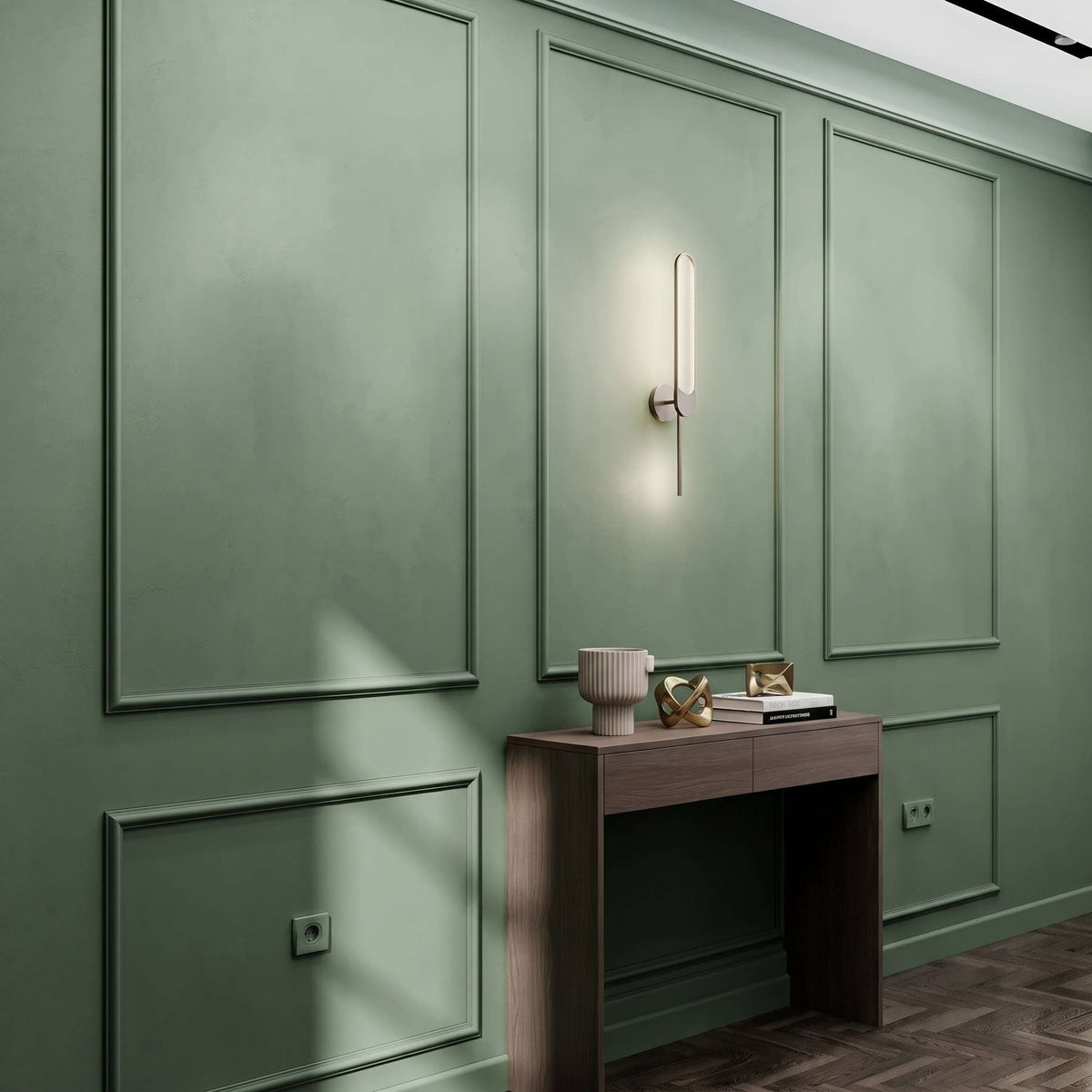Sage green picture frame wall molding in a home office