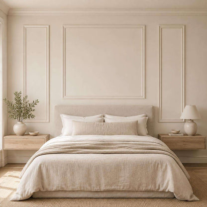 Bedroom wall molding design: cream picture frame wall molding behind the bed, wide view