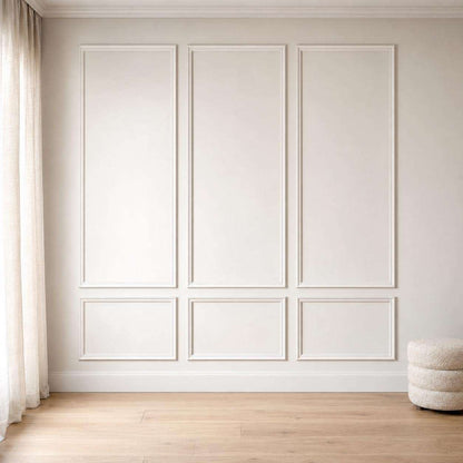 White picture frame wall molding on an accent wall