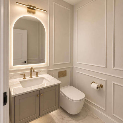 Greige picture frame wall molding in a bathroom