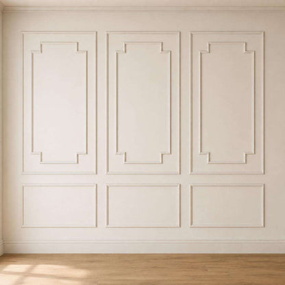 White step-corner picture frame molding on an accent wall