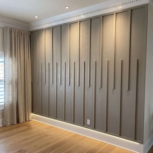 Modern wall molding: charcoal gray vertical slat wall molding on an accent wall alternate view