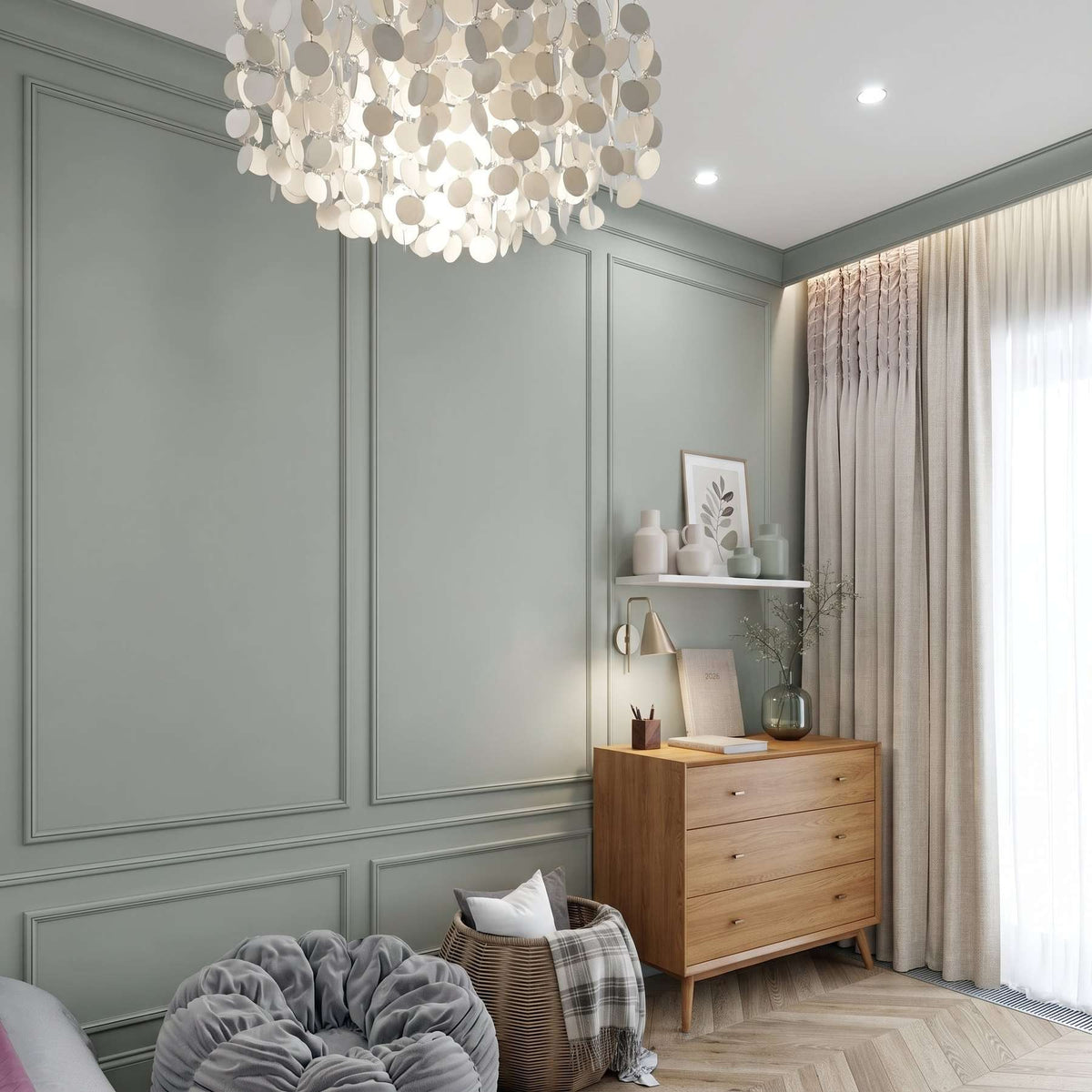 Sage green picture frame wall molding in a nursery