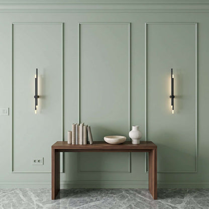 Sage green picture frame wall molding in an entryway