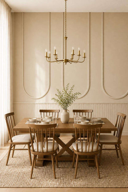 Cream arched wall molding in a dining room